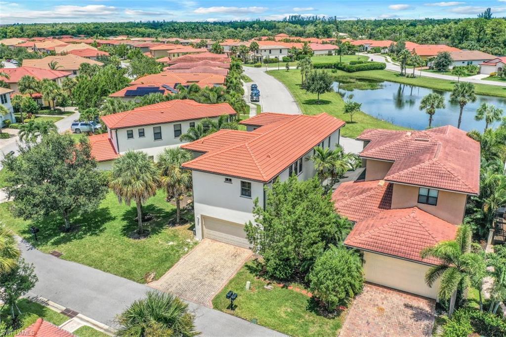 1276 Kendari Terrace Naples, FL 34113 - Photo 3 of 31 an aerial view of residential houses with outdoor space and river