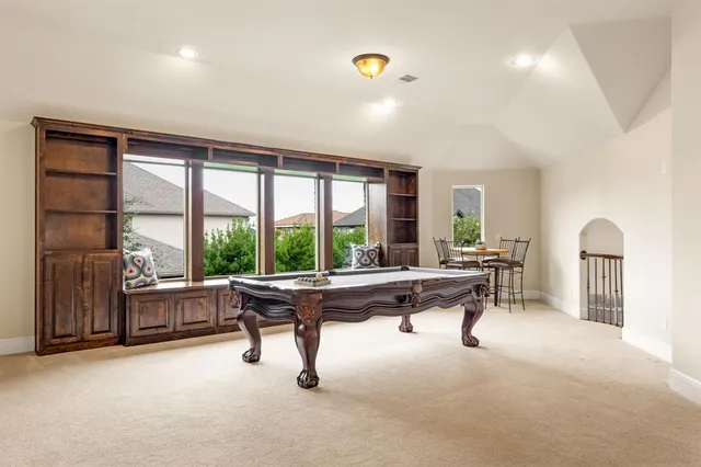 a view of a livingroom with furniture and window