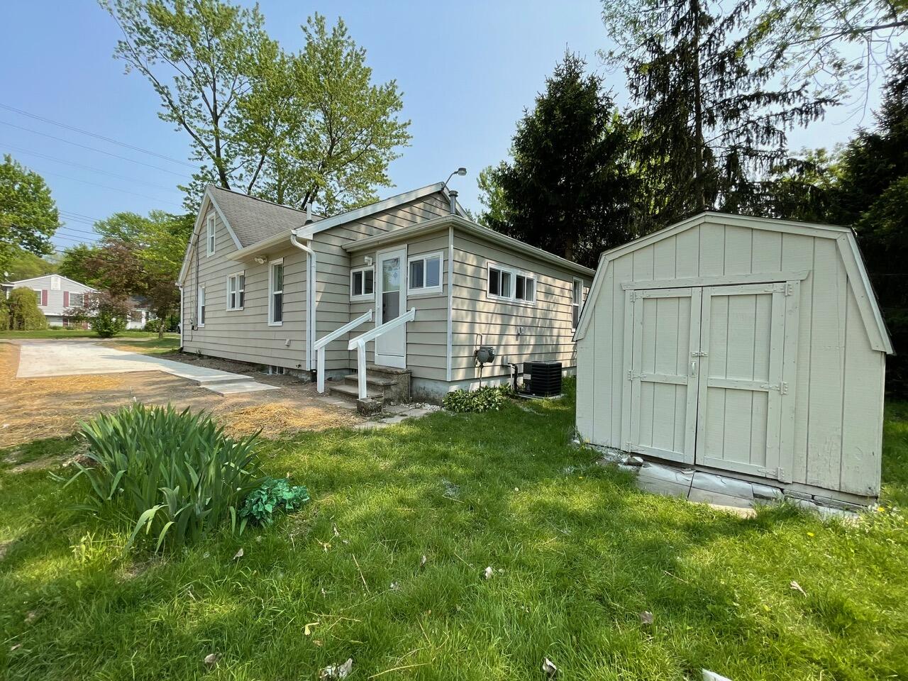 5138 Hughes Road Lansing, MI 48911 - Photo 2 of 32 70613160734__E2F29DC0-25D2-49B5-A220-B78