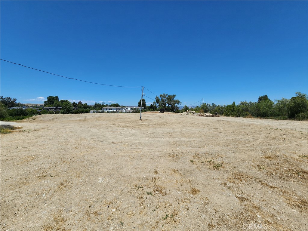 24005 Hidden Ridge Road Hidden Hills, CA 91302 - Photo 3 of 7 View across the building pad with the entry driveway to the lot at the middle left side of photo.
