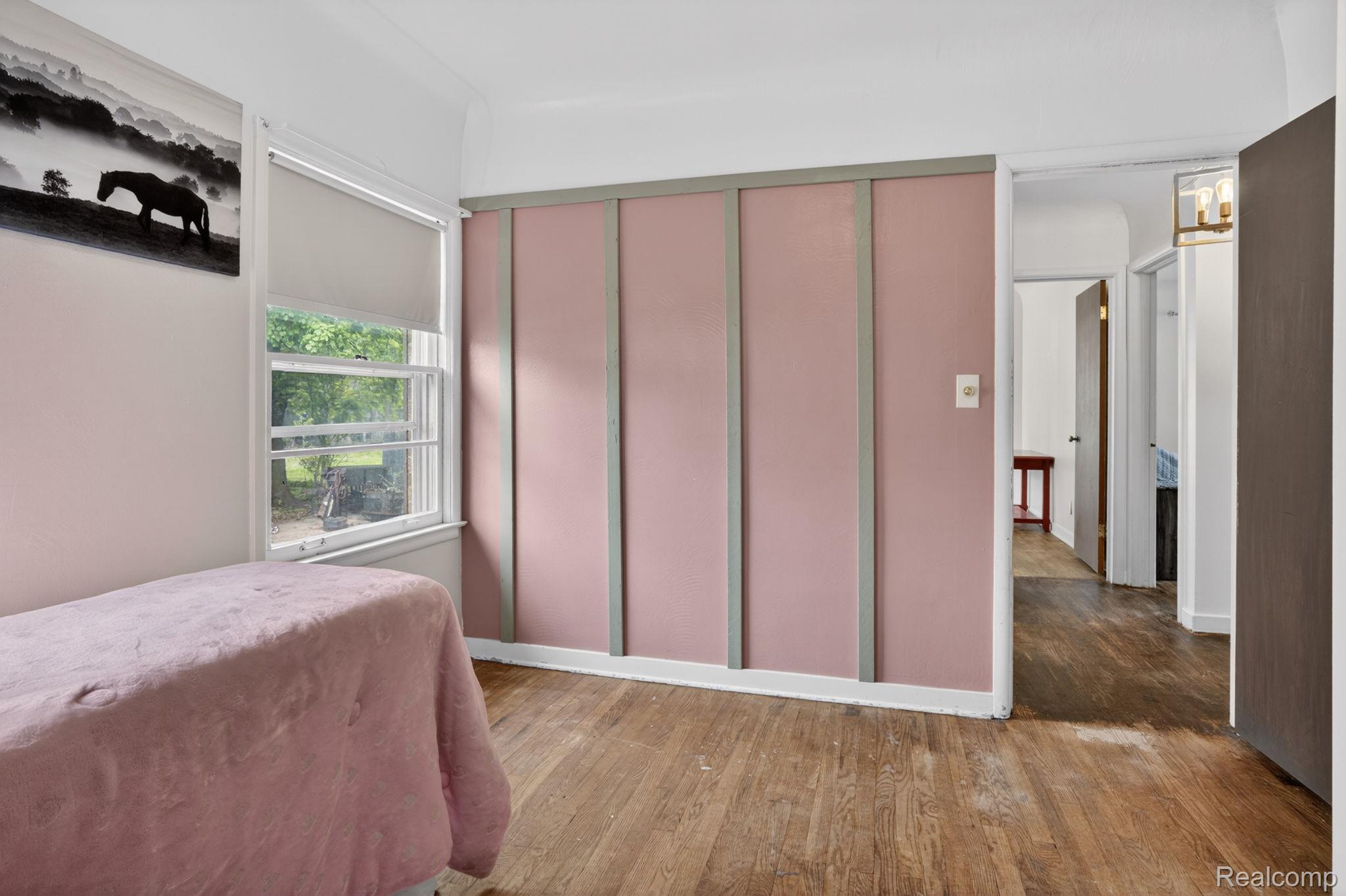 1209 Beatrice Street Flushing, MI 48433 - Photo 19 of 39 Bedroom with wood finished floors and a closet