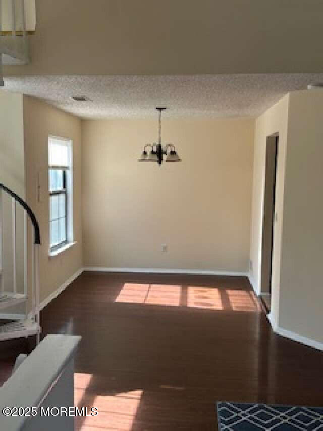 702 Goldthread Court Jackson, NJ 08527 - Photo 4 of 20 a view of an empty room and window