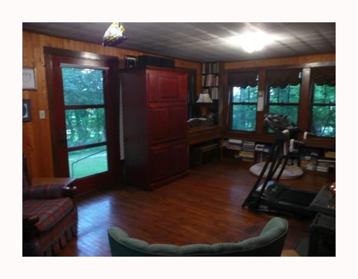 1414 State Rt 30 Clinton, PA 15026 - Photo 7 of 15 Den/Family/Great Room. Currently used as the TV room with a wonderful Soapstone Wood Sove (out of view).
