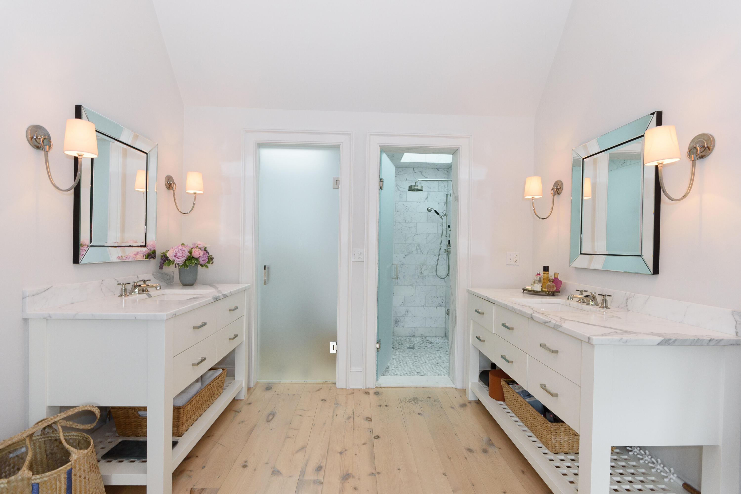118 Goodwives River Road Darien, CT 06820 - Photo 24 of 68 a bathroom with a double vanity sink mirror and shower