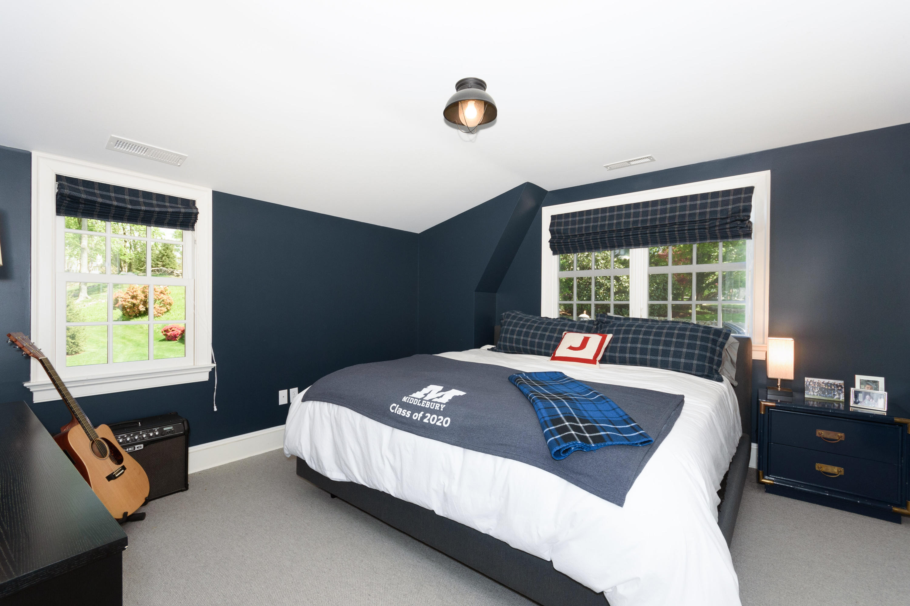 118 Goodwives River Road Darien, CT 06820 - Photo 33 of 68 a bed sitting in a bedroom next to a window
