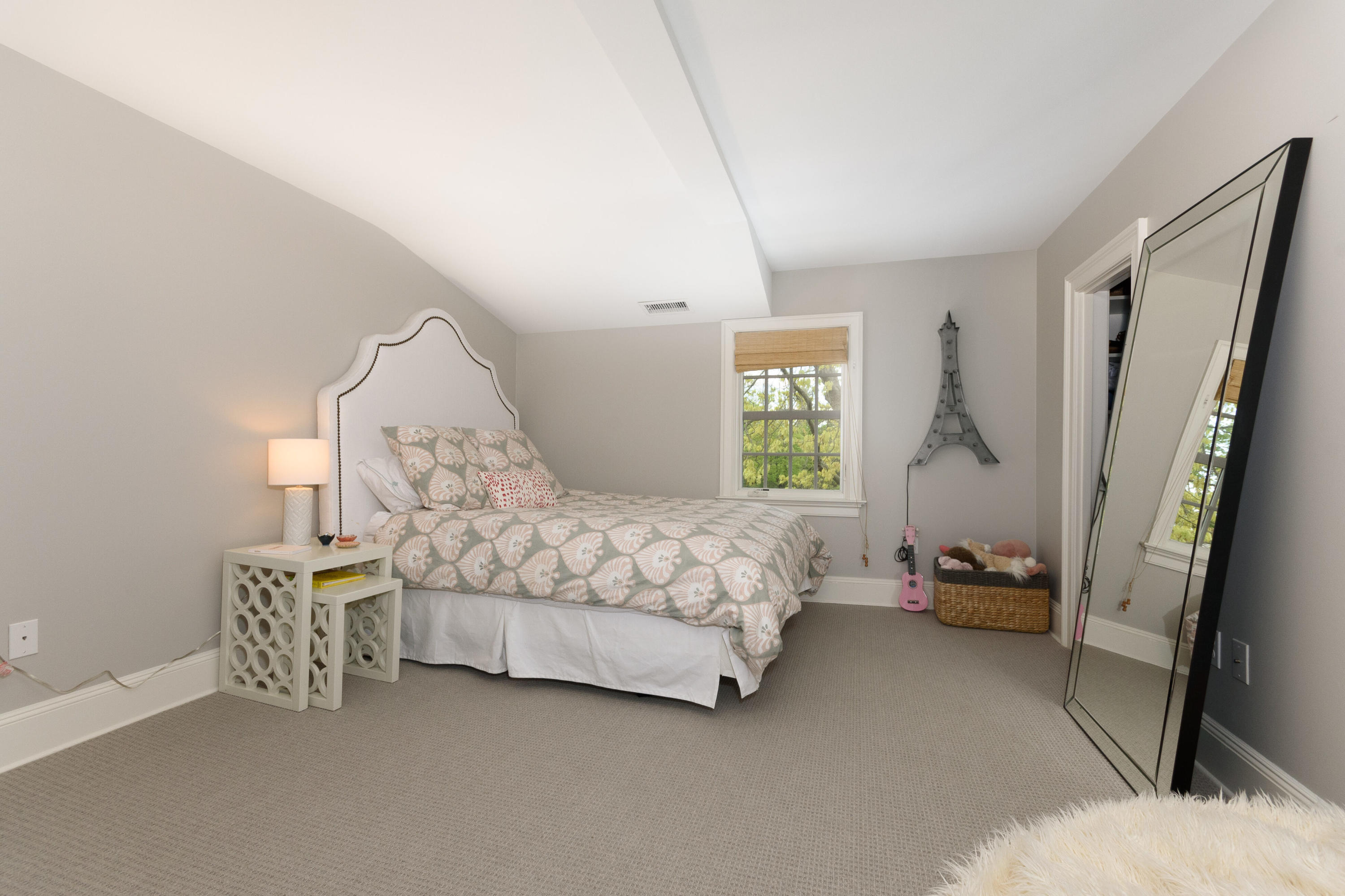 118 Goodwives River Road Darien, CT 06820 - Photo 35 of 68 a bed sitting in a bedroom next to a window