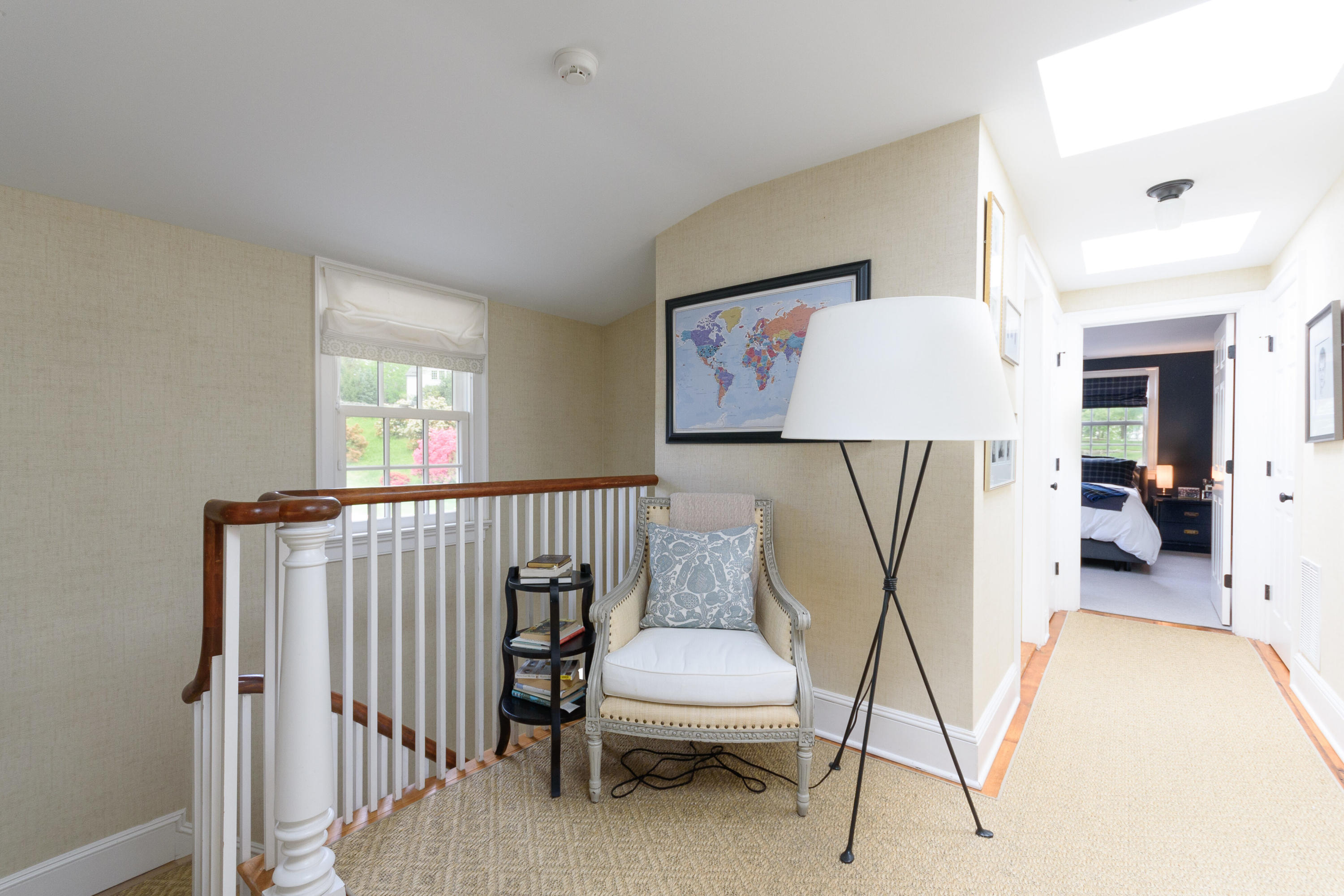 118 Goodwives River Road Darien, CT 06820 - Photo 40 of 68 a view of a hallway with a livingroom and furniture