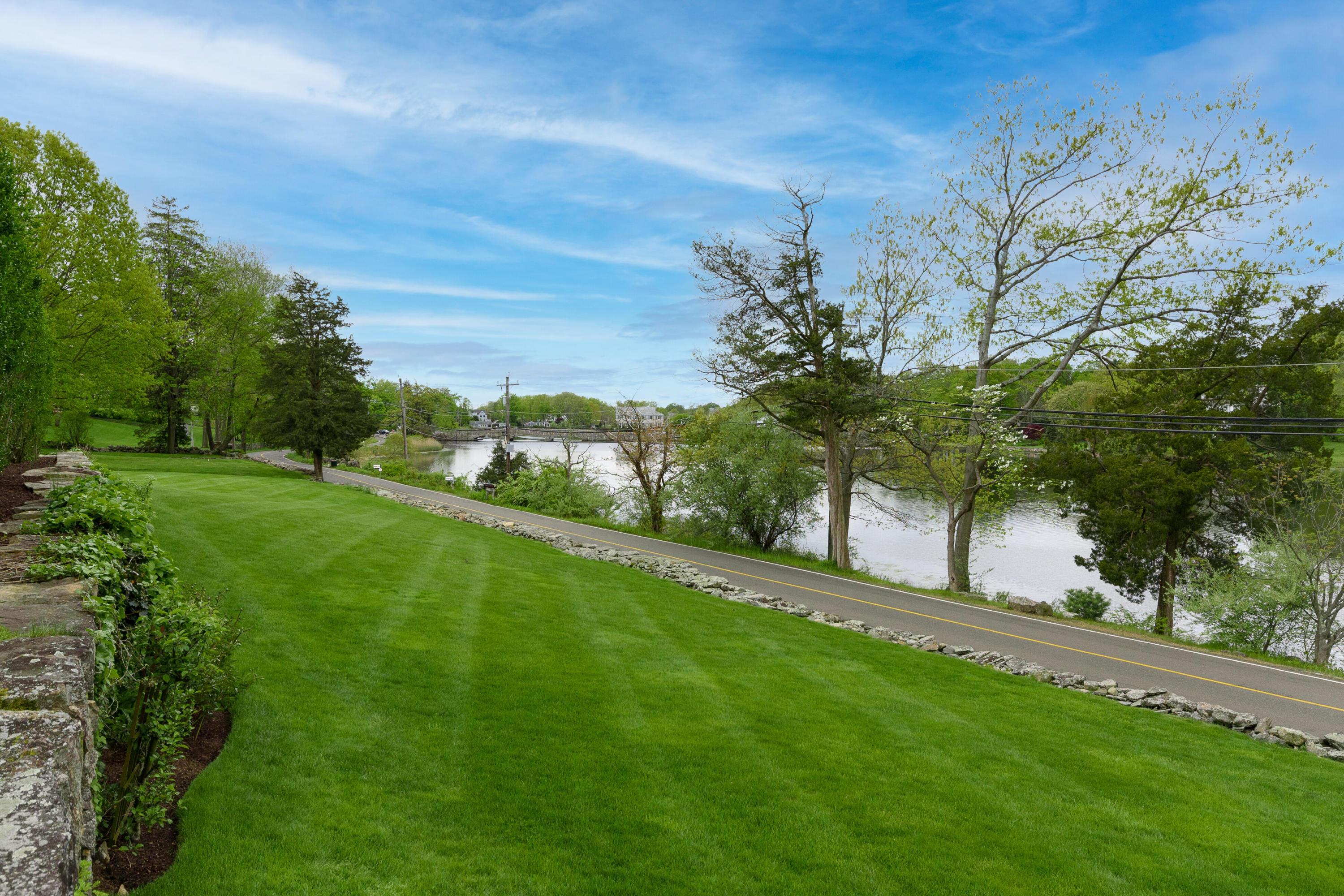 118 Goodwives River Road Darien, CT 06820 - Photo 53 of 68 a view of a yard with an trees