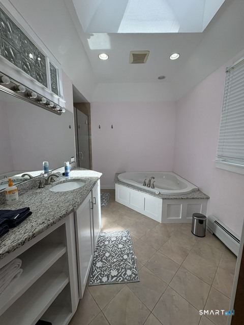 40 Looking Glass Hill Road Litchfield, CT 06750 - Photo 17 of 33 a bathroom with a sink and a mirror