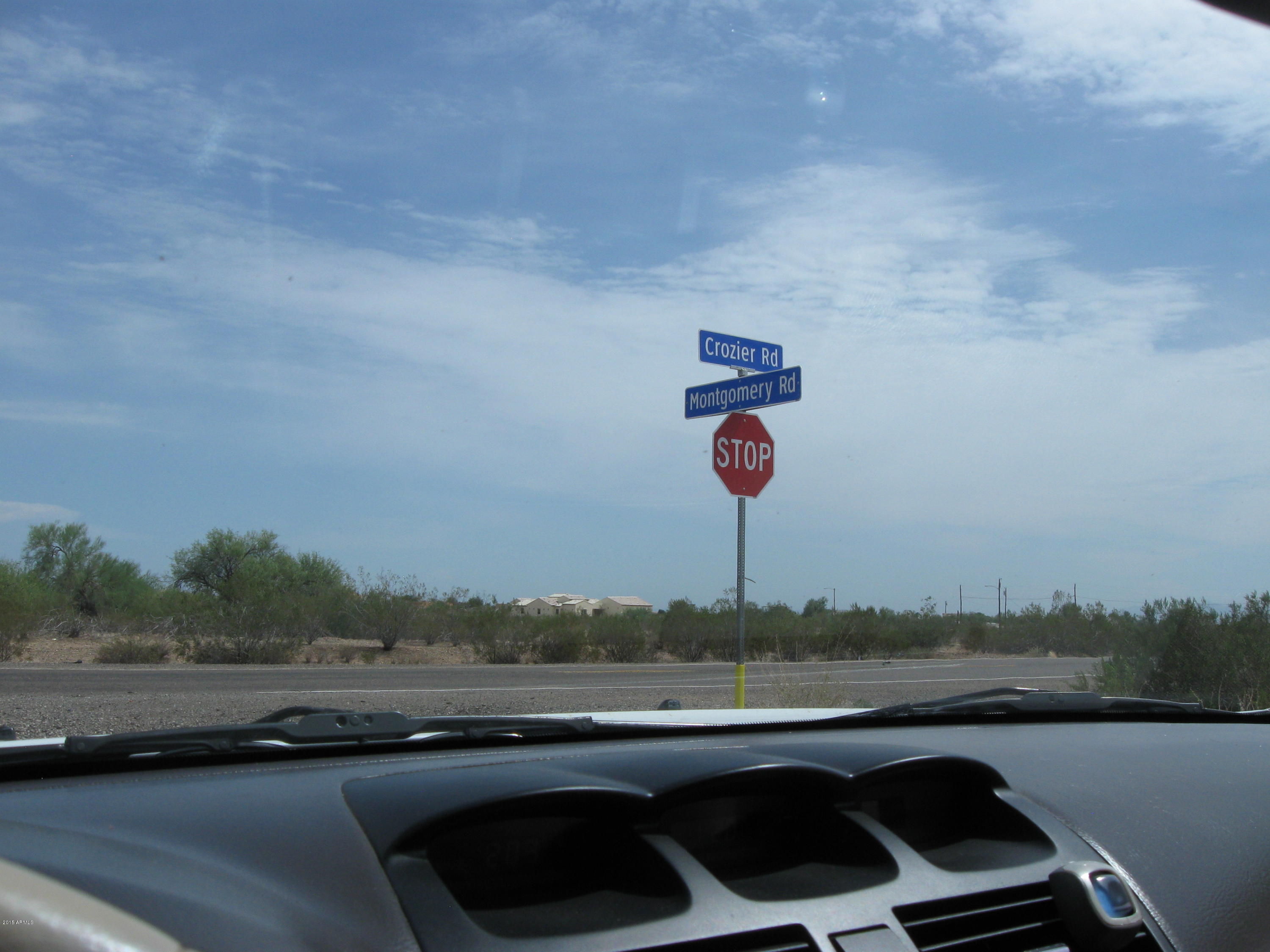 22000 West Montgomery Road Wittmann, AZ 85361 - Photo 8 of 9 Cross roads to property
