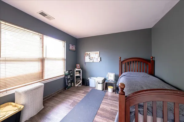 a living room with furniture and windows