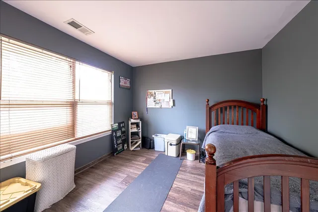 a living room with furniture and windows