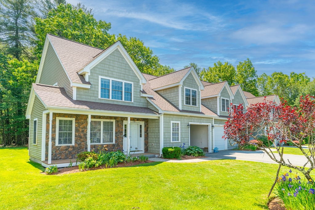 53 Baldwin Road, Unit 1201 Billerica, MA 01821 - Photo 2 of 36 front view of a house with a yard