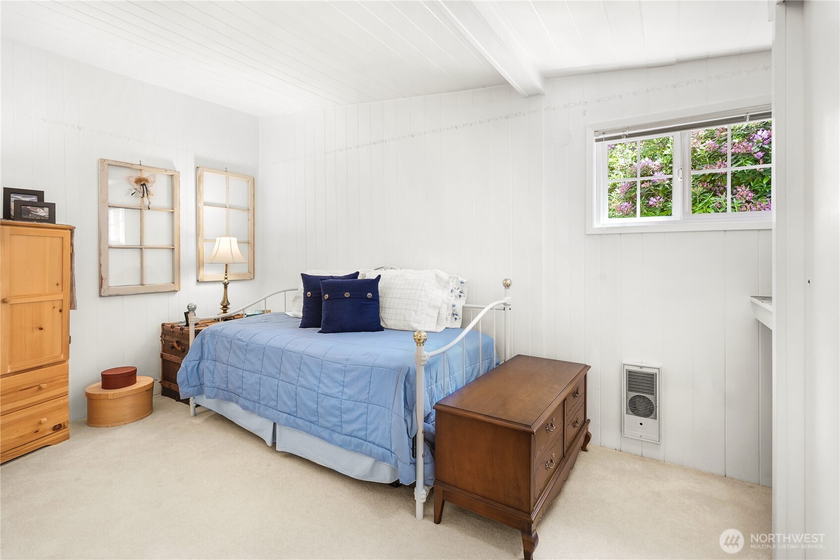 29 Northwest Lake Roesiger Road Snohomish, WA 98290 - Photo 17 of 38 a bedroom with a bed and wooden floor