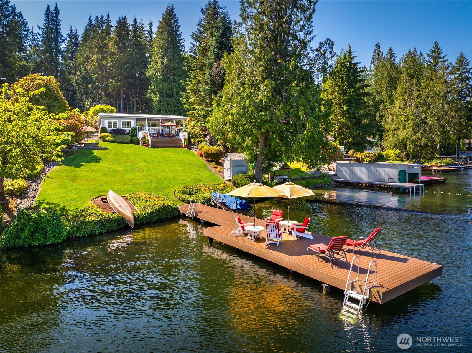 29 Northwest Lake Roesiger Road Snohomish, WA 98290 - Photo 24 of 38 a small pool with lots of trees in the background
