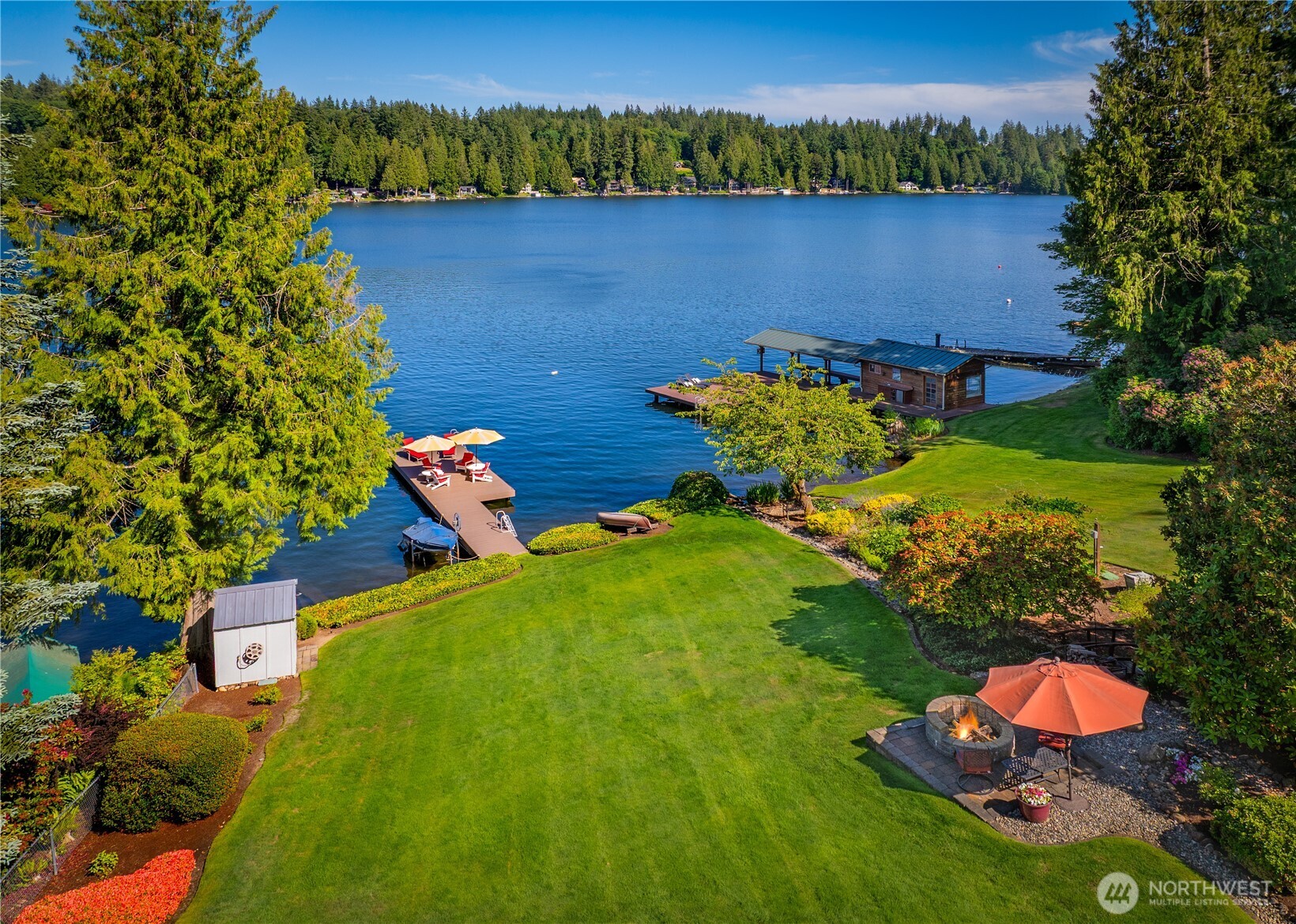 29 Northwest Lake Roesiger Road Snohomish, WA 98290 - Photo 3 of 38 an aerial view of a house with a yard