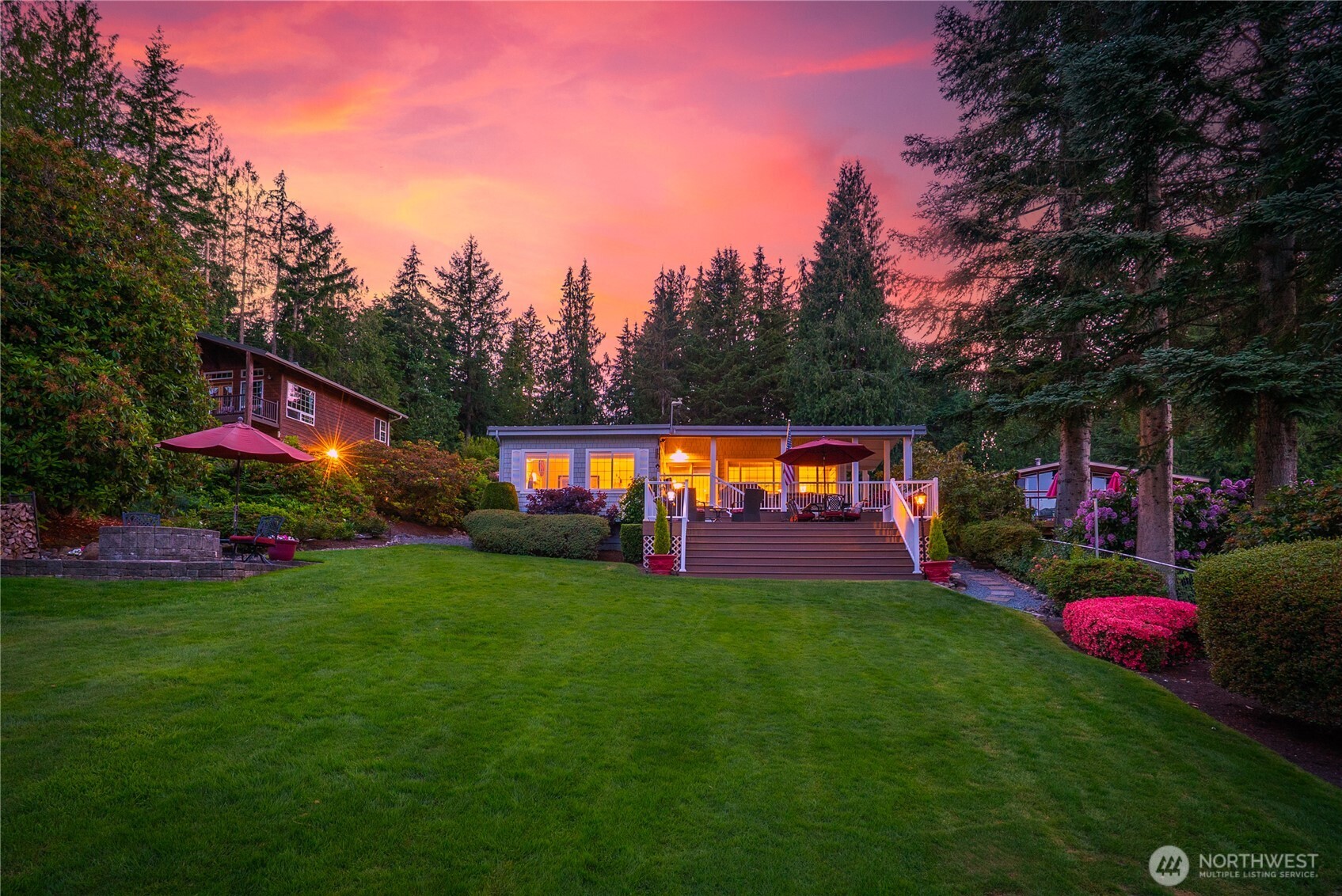 29 Northwest Lake Roesiger Road Snohomish, WA 98290 - Photo 33 of 38 a view of a house with backyard and sitting area