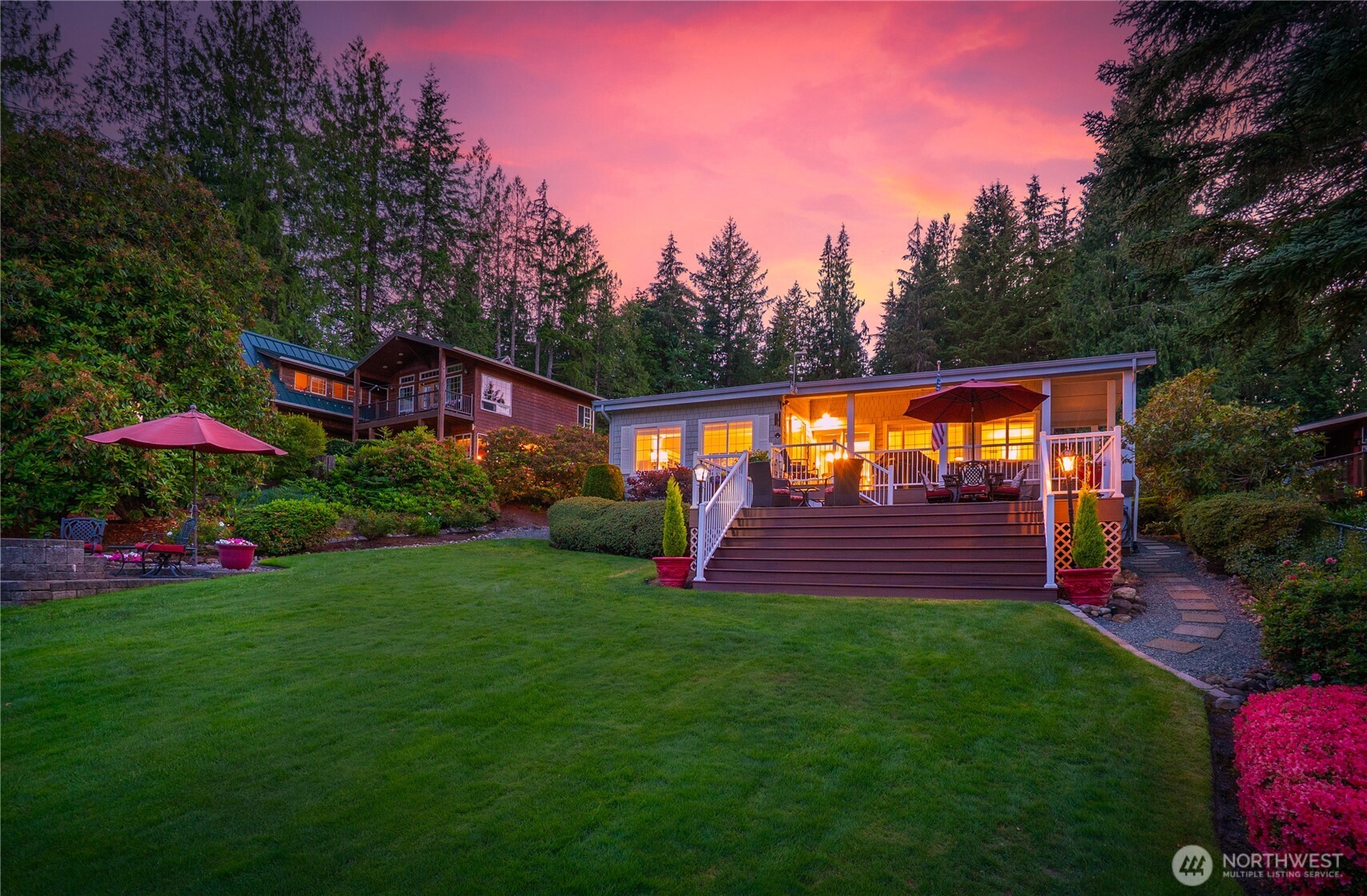 29 Northwest Lake Roesiger Road Snohomish, WA 98290 - Photo 34 of 38 a view of a wooden deck and a yard in the back