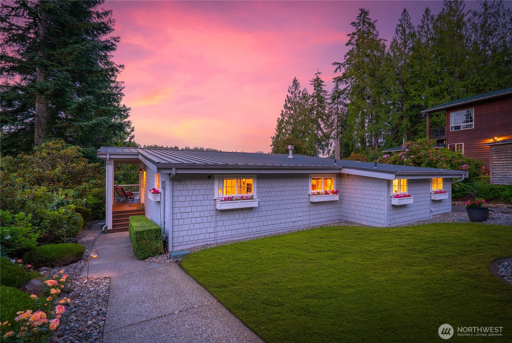 29 Northwest Lake Roesiger Road Snohomish, WA 98290 - Photo 36 of 38 a front view of a house with a yard and garage