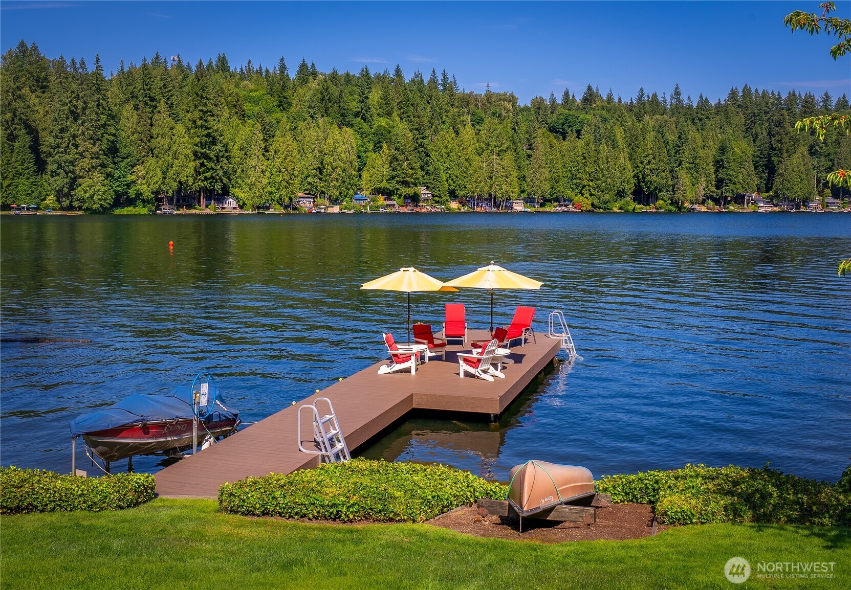 29 Northwest Lake Roesiger Road Snohomish, WA 98290 - Photo 4 of 38 swimming pool with outdoor seating and garden