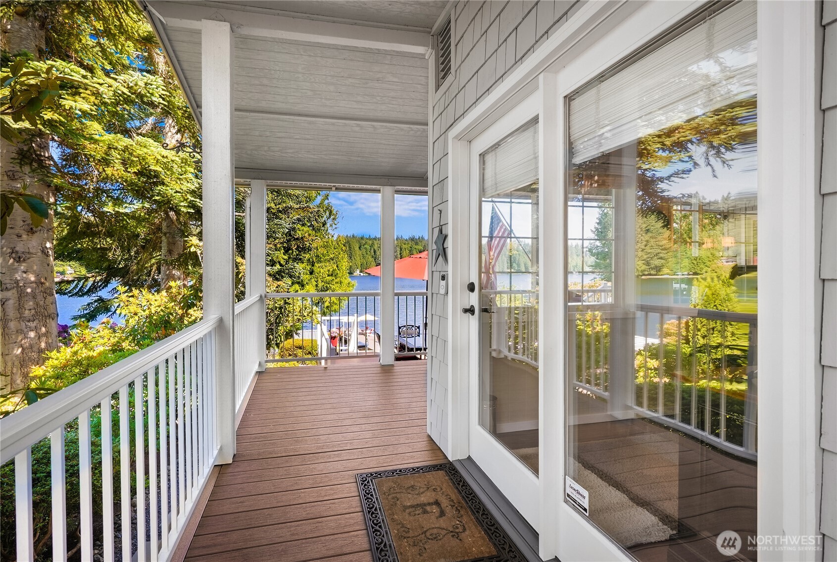 29 Northwest Lake Roesiger Road Snohomish, WA 98290 - Photo 6 of 38 a view of a porch with wooden floor and outdoor space