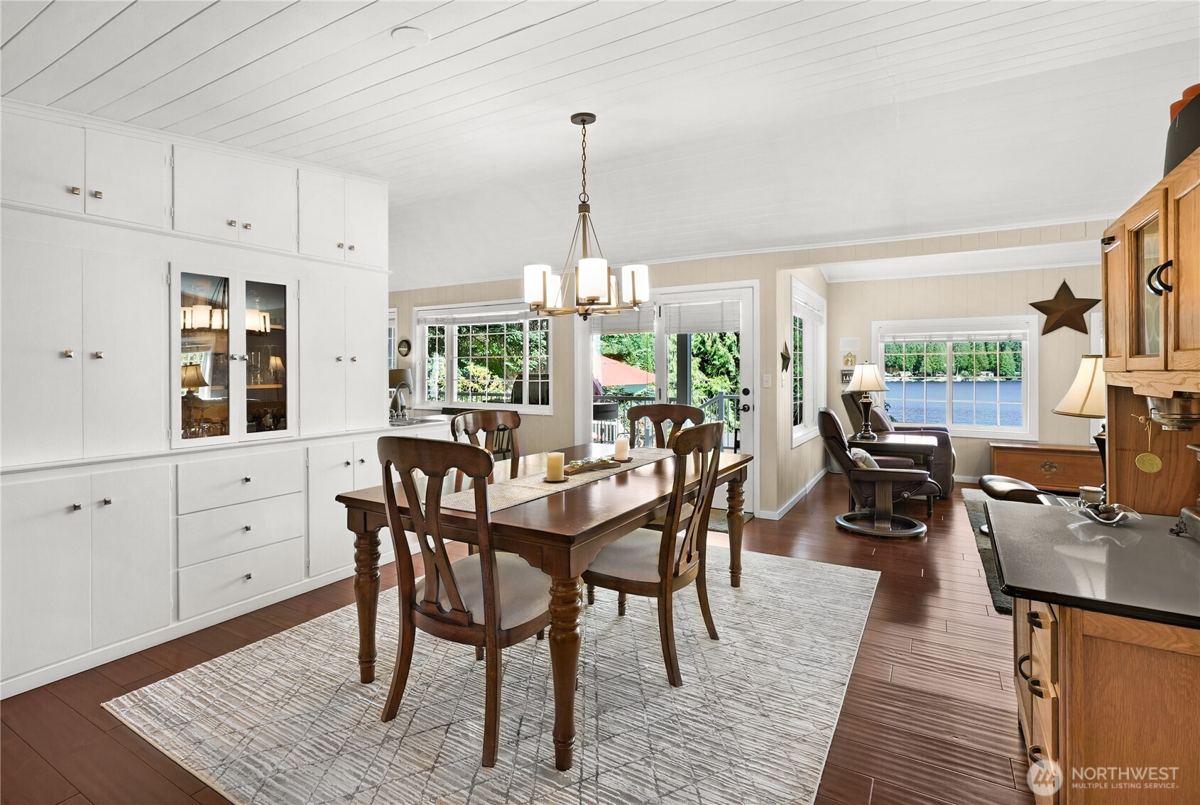 29 Northwest Lake Roesiger Road Snohomish, WA 98290 - Photo 9 of 38 a dining room with furniture window wooden floor
