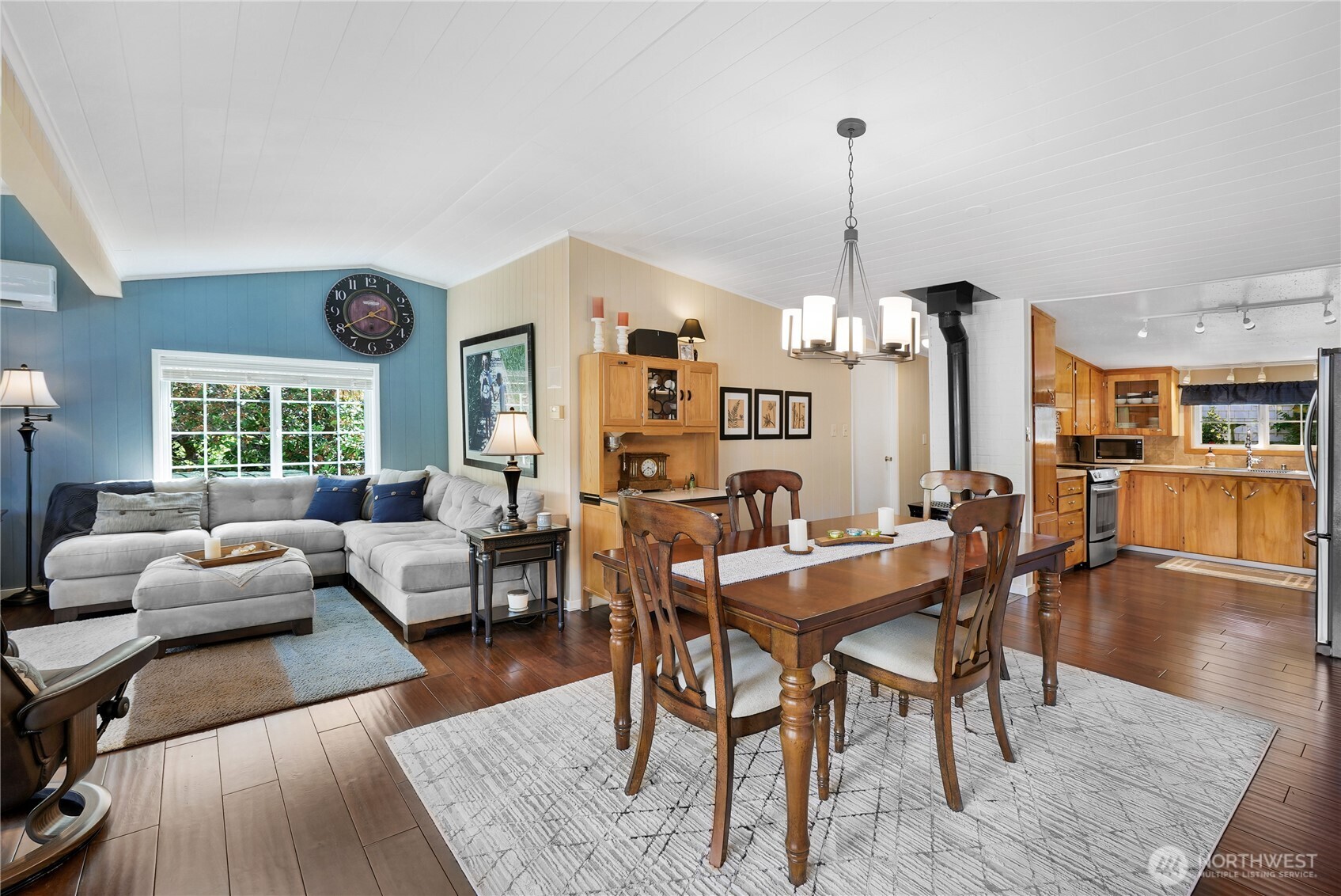 29 Northwest Lake Roesiger Road Snohomish, WA 98290 - Photo 10 of 38 a view of a dining room with furniture window and wooden floor