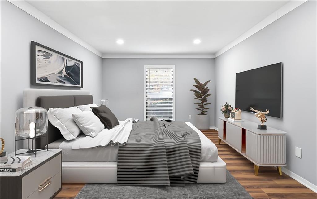 601 Wynnes Ridge Circle Southeast Marietta, GA 30067 - Photo 16 of 28 a living room with furniture and a flat screen tv