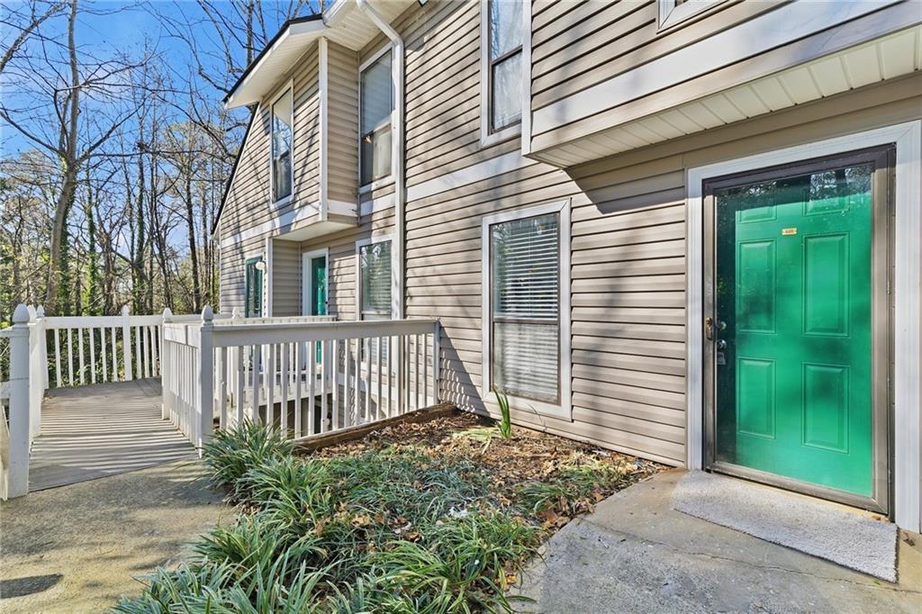 601 Wynnes Ridge Circle Southeast Marietta, GA 30067 - Photo 2 of 28 a front view of a house with a garden