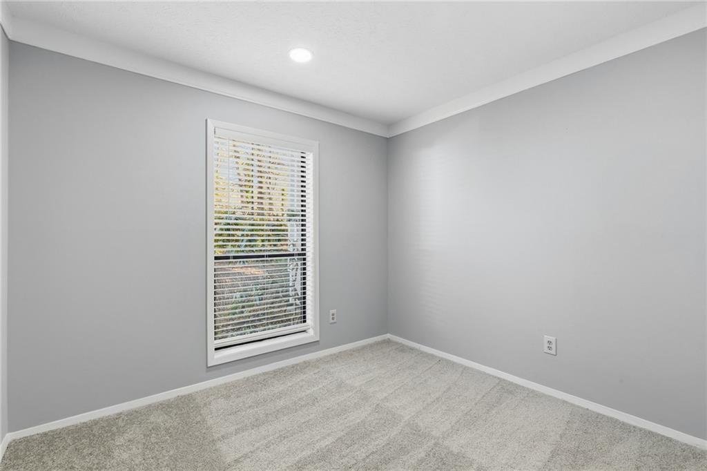 601 Wynnes Ridge Circle Southeast Marietta, GA 30067 - Photo 23 of 28 a view of an empty room with a window