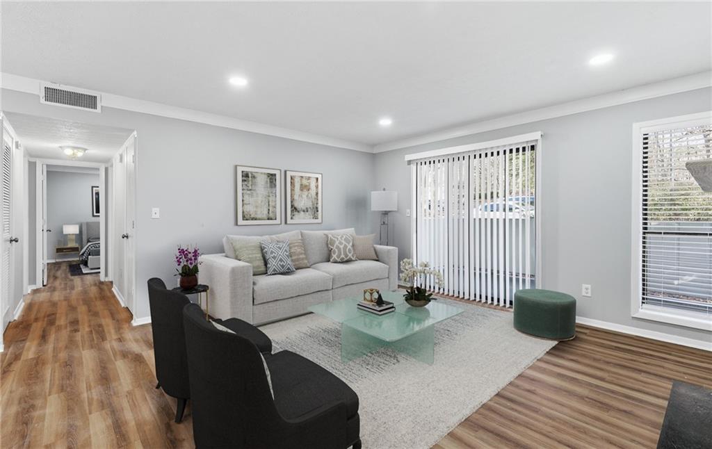 601 Wynnes Ridge Circle Southeast Marietta, GA 30067 - Photo 5 of 28 a living room with furniture and a window