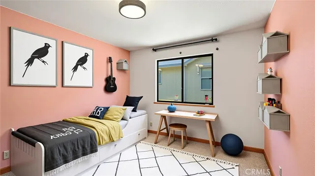 a bedroom with a bed and cabinets