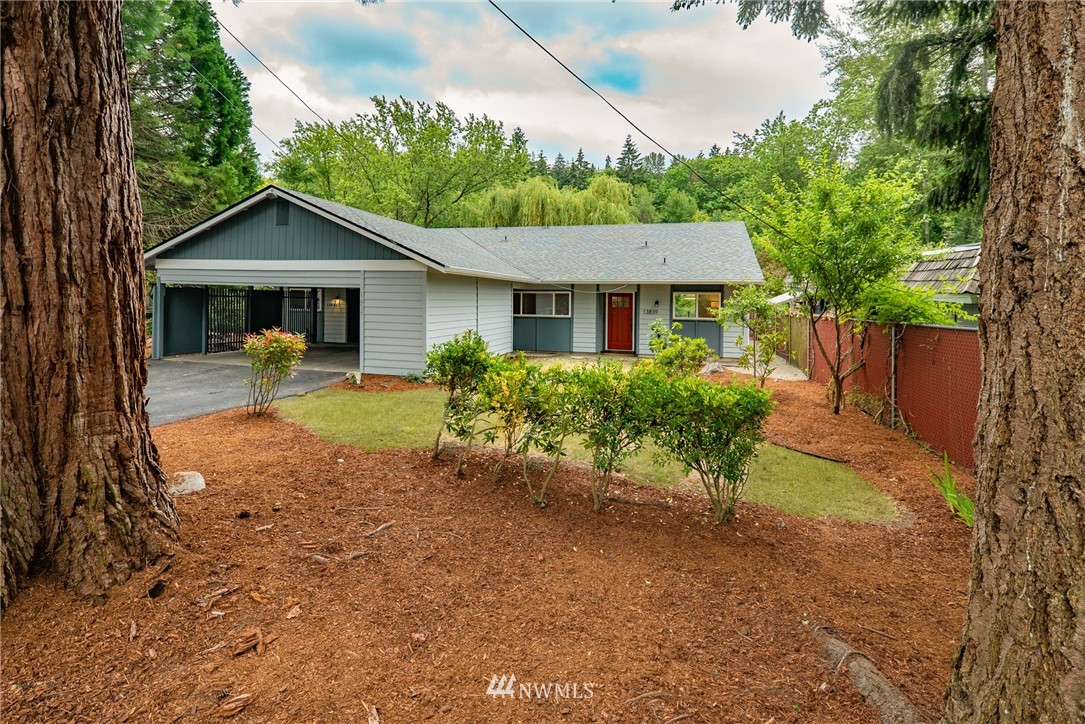 13839-13841 Southeast Allen Rd. Bellevue, WA 98006 - Photo 1 of 25 front view of a house with a yard