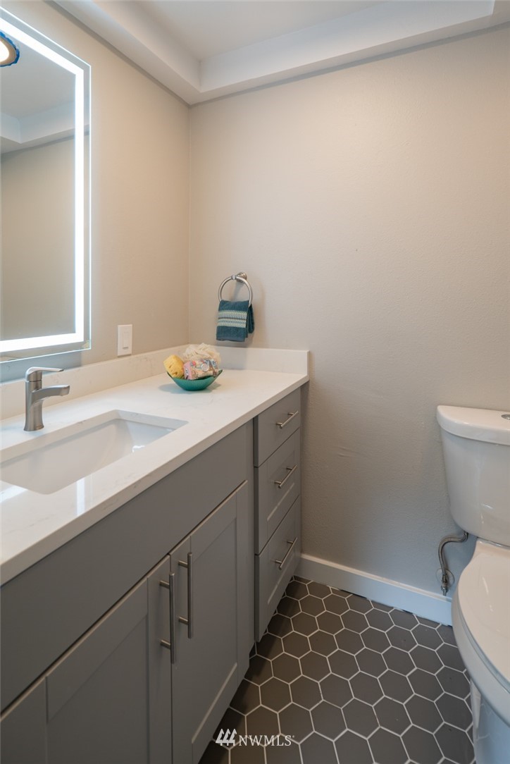 13839-13841 Southeast Allen Rd. Bellevue, WA 98006 - Photo 16 of 25 a bathroom with a sink and a toilet
