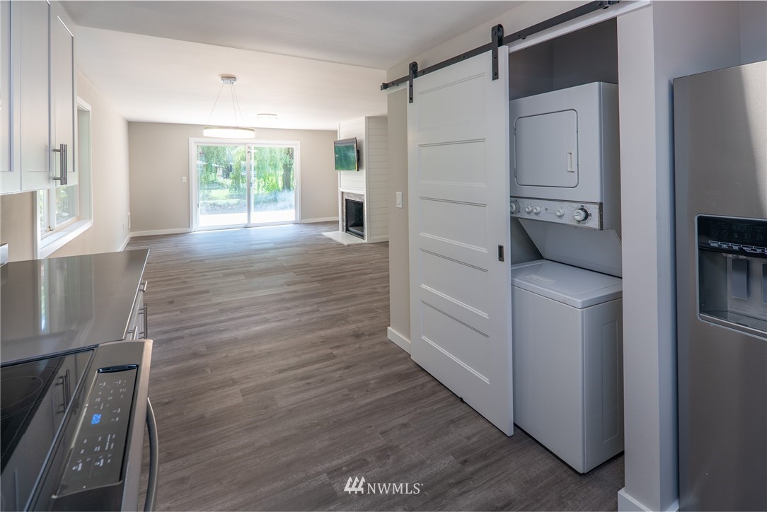 13839-13841 Southeast Allen Rd. Bellevue, WA 98006 - Photo 20 of 25 a kitchen with a refrigerator and window
