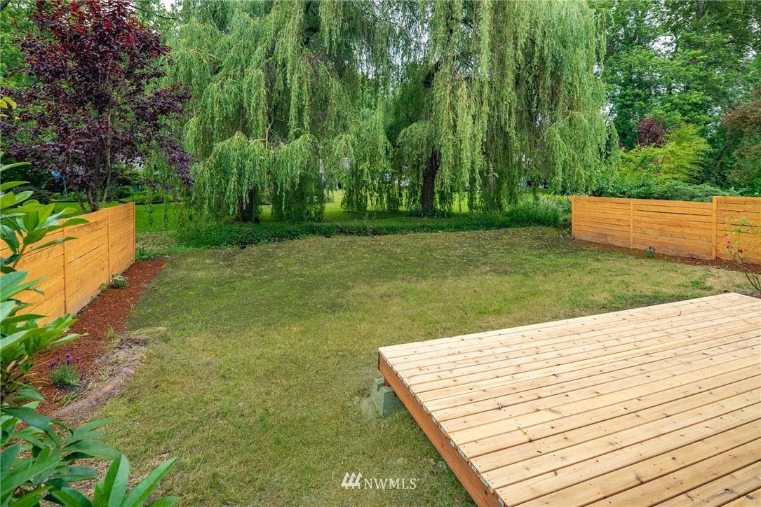 13839-13841 Southeast Allen Rd. Bellevue, WA 98006 - Photo 24 of 25 a view of a backyard with sitting area