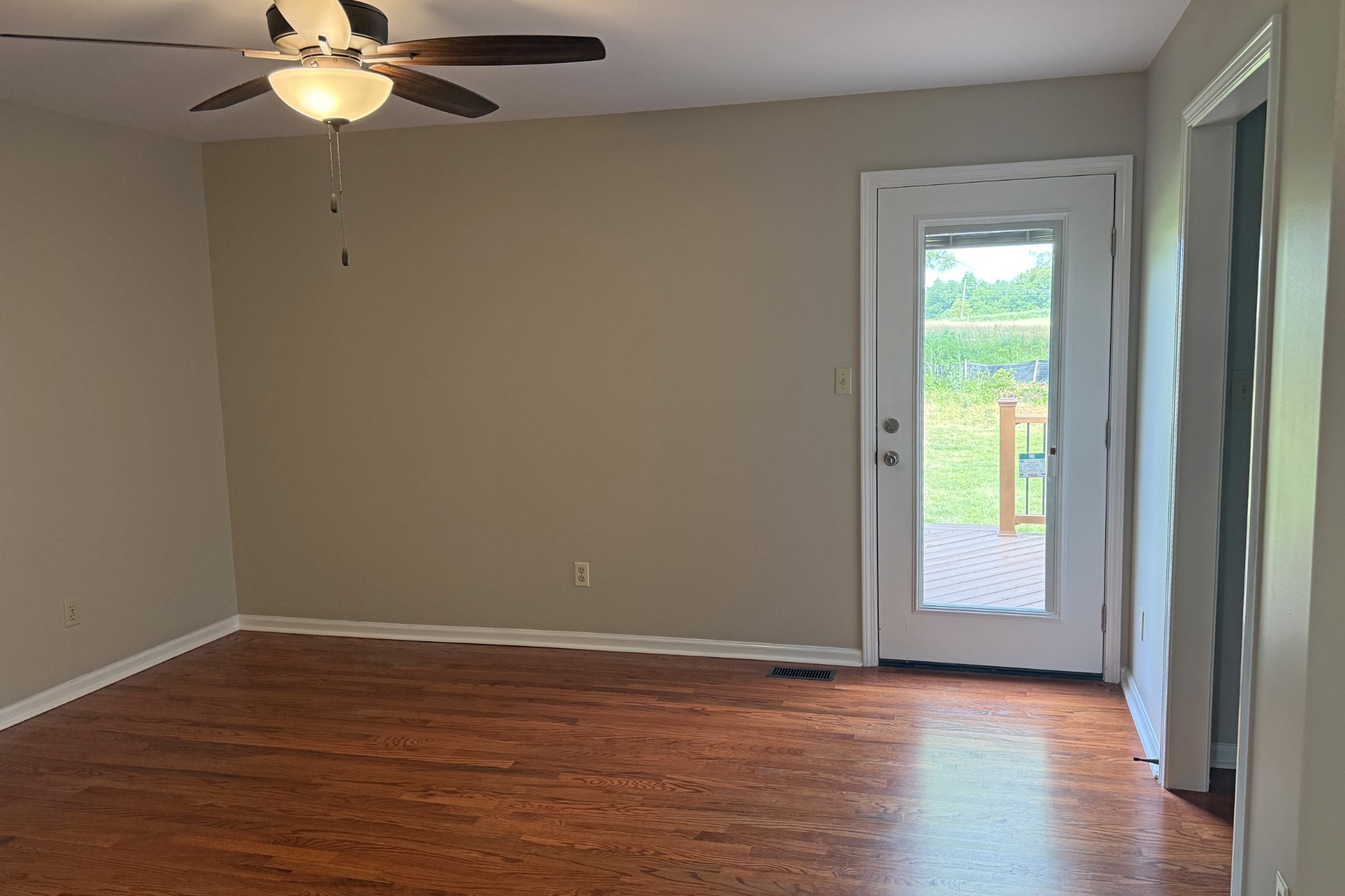 206 Stephens Hill Road Franklin, KY 42134 - Photo 7 of 21 a view of empty room with window and wooden floor
