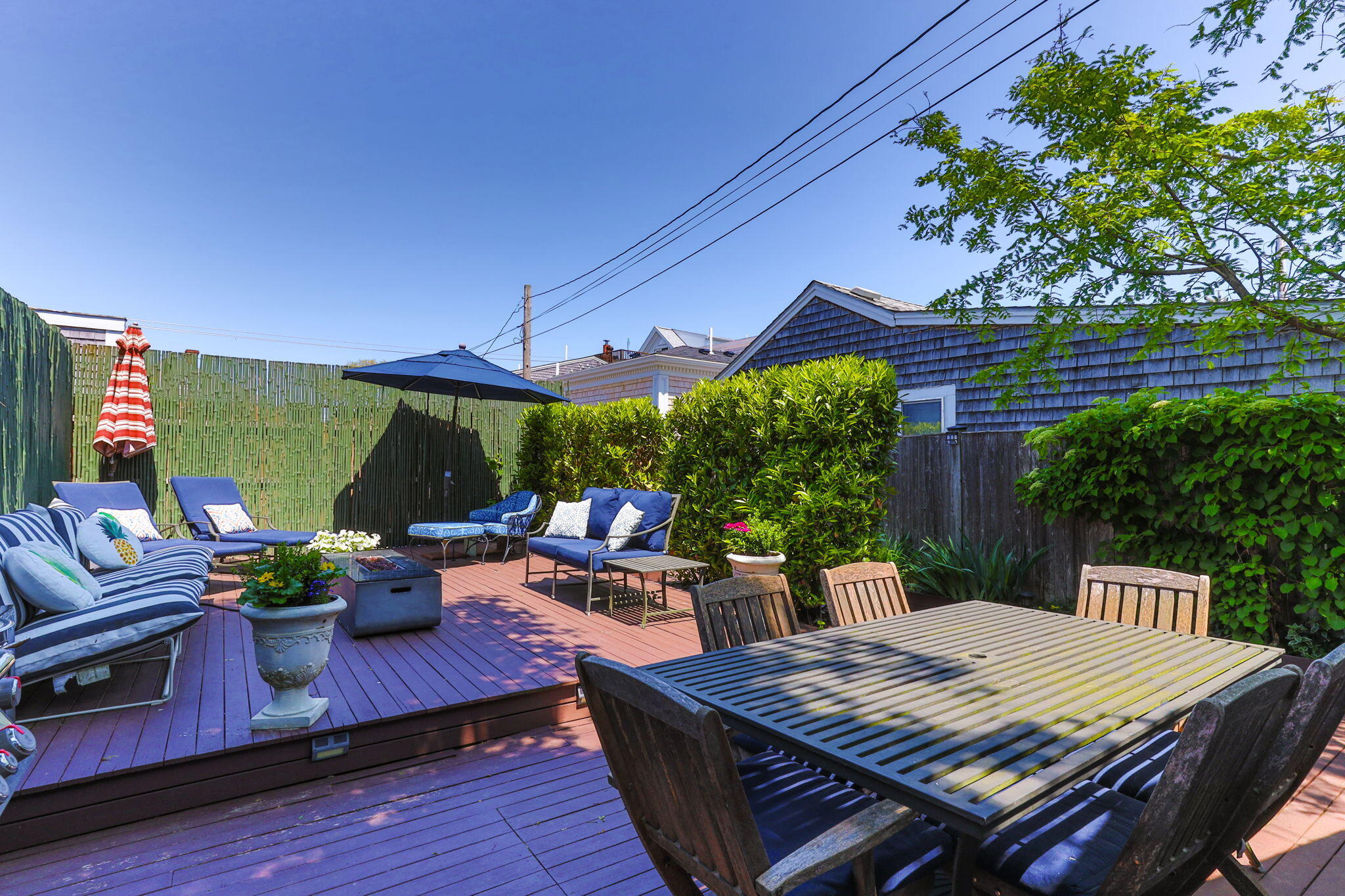 342 B Commercial Street Provincetown, MA 02657 - Photo 14 of 42 a outdoor living space with furniture and a garden