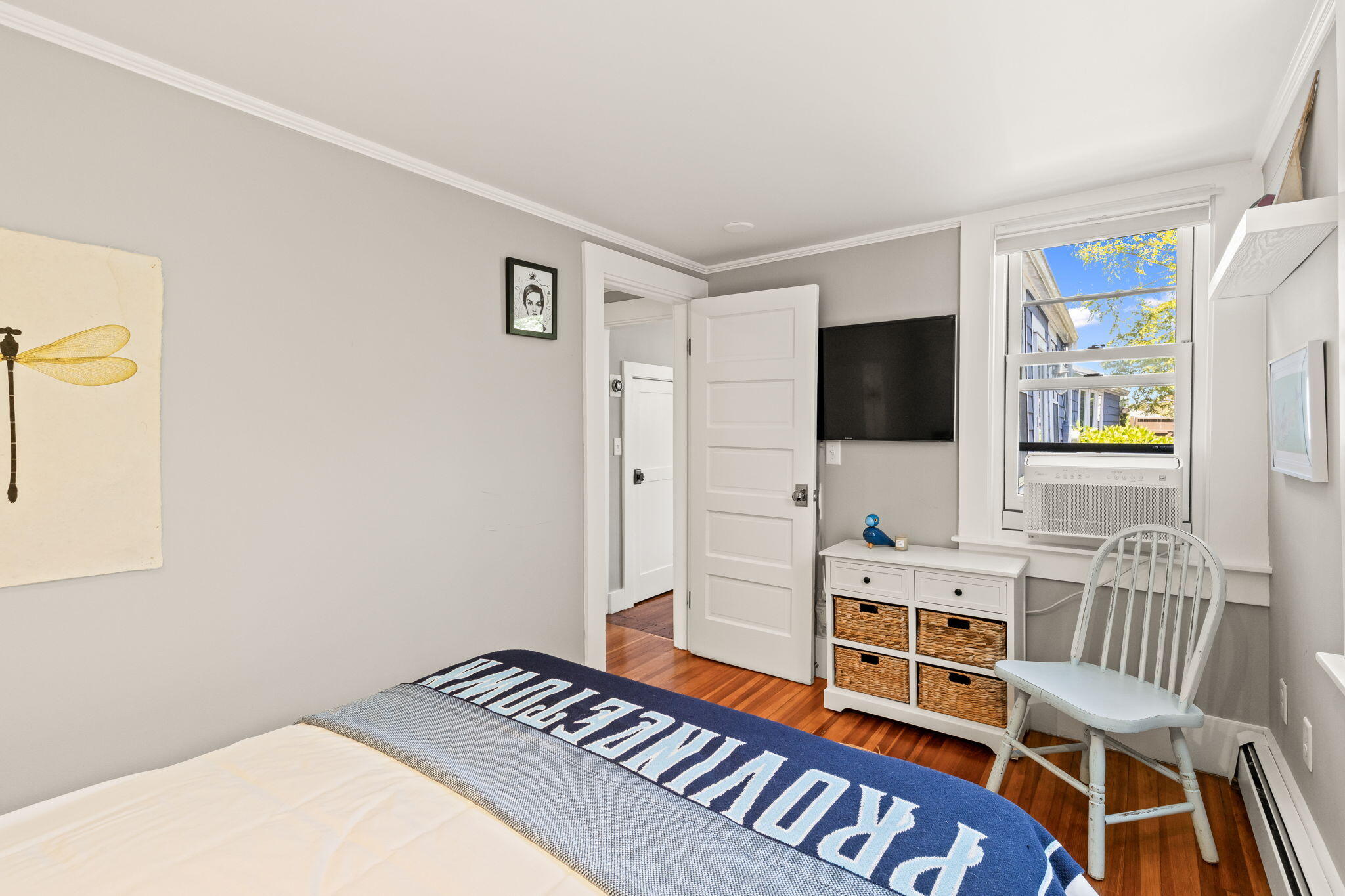 342 B Commercial Street Provincetown, MA 02657 - Photo 19 of 42 a living room with furniture and a flat screen tv