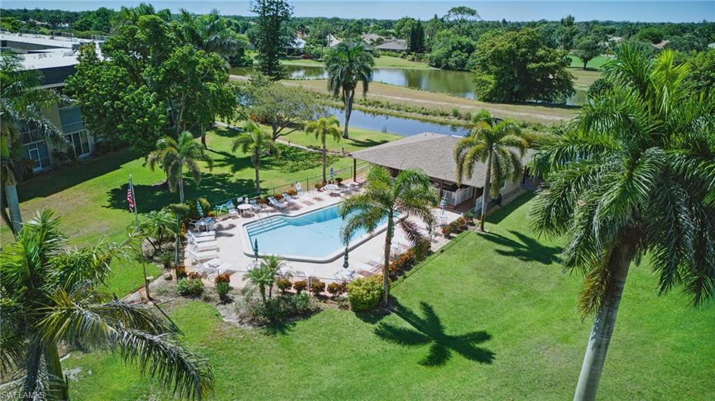 5419 Rattlesnake Hamm Road, Unit 304F Naples, FL 34113 - Photo 1 of 15 AERIAL VIEWS OF COMMUNITY POOL AND PEACEFUL WATER AND GOLF COURSE...