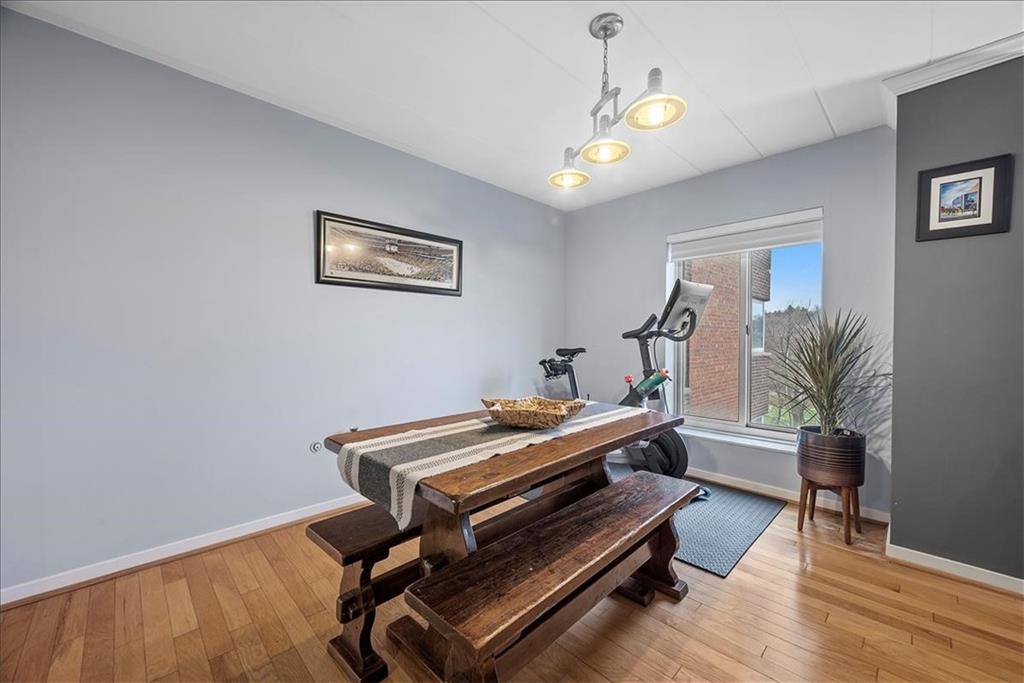 5 Bayard Road, Unit 617 Pittsburgh, PA 15213 - Photo 6 of 15 a living room with furniture and wooden floor