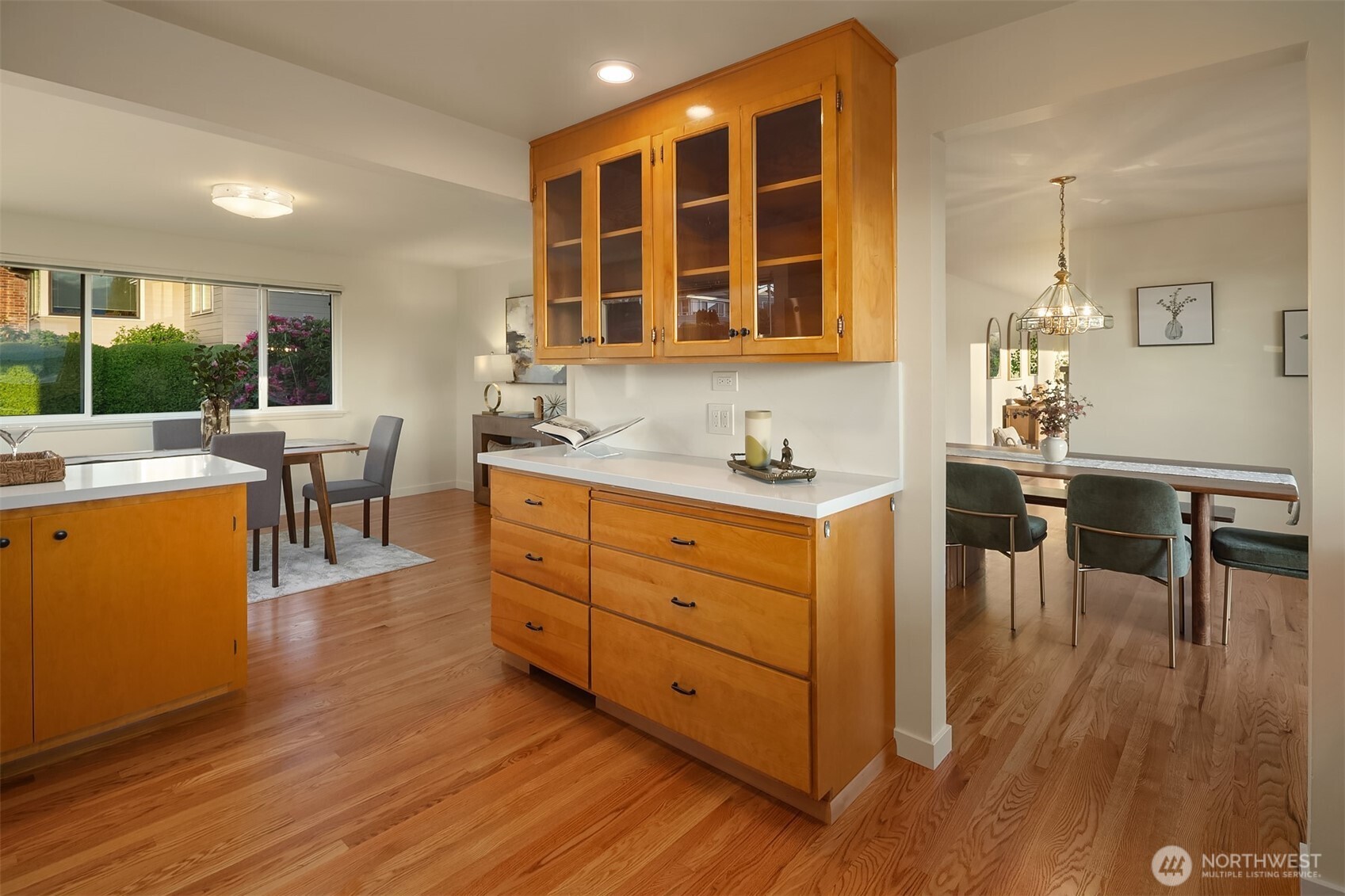 814 Dayton Street Edmonds, WA 98020 - Photo 15 of 36 a living room with stainless steel appliances kitchen island granite countertop wooden floor a dining table and chairs