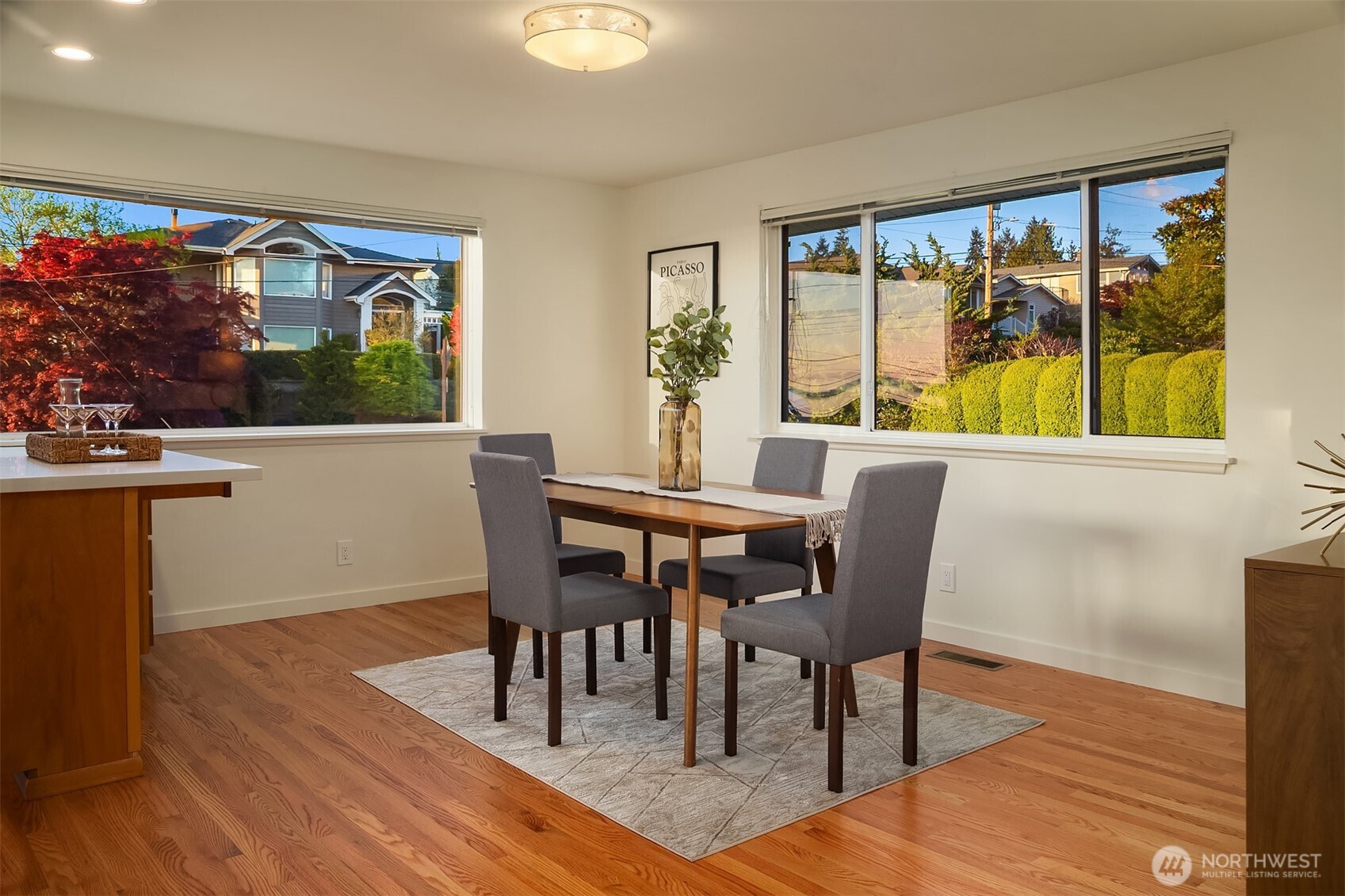 814 Dayton Street Edmonds, WA 98020 - Photo 18 of 36 a view of a dining room with furniture large window and wooden floor
