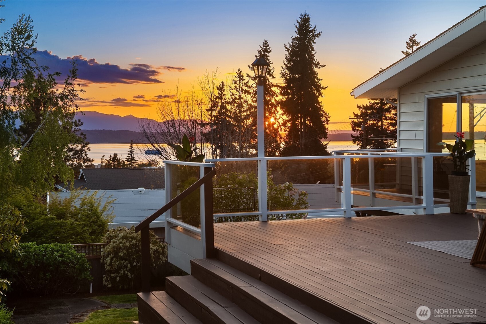 814 Dayton Street Edmonds, WA 98020 - Photo 2 of 36 a view of a roof deck with wooden floor and city view