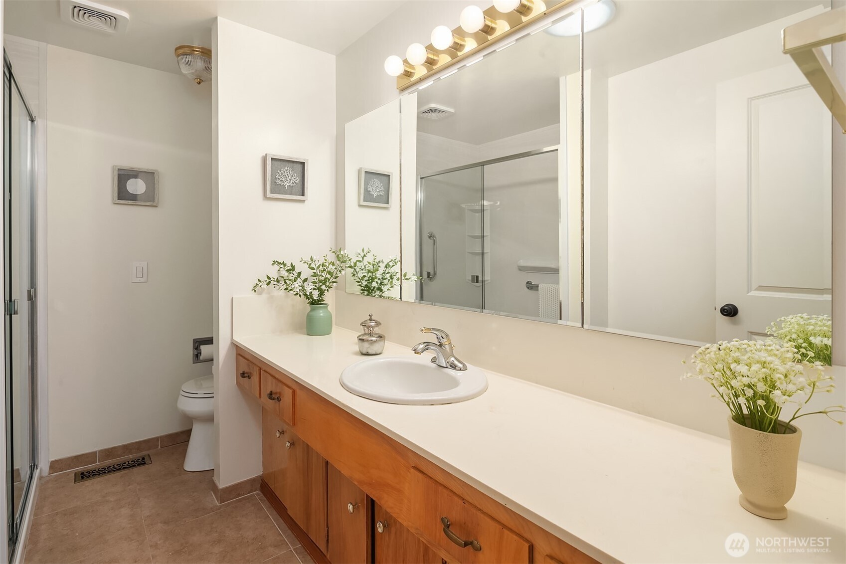 814 Dayton Street Edmonds, WA 98020 - Photo 23 of 36 a bathroom with a sink a vanity and a mirror
