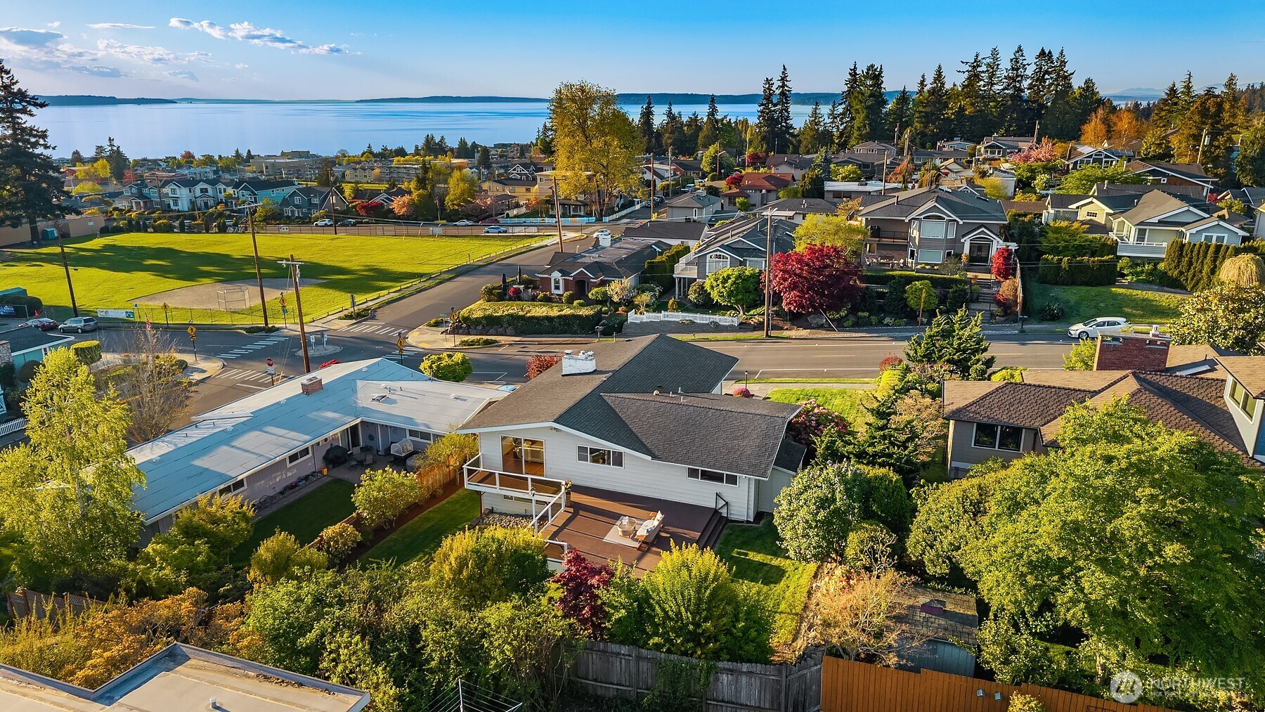 814 Dayton Street Edmonds, WA 98020 - Photo 35 of 36 an aerial view of a house with a swimming pool yard and lake view