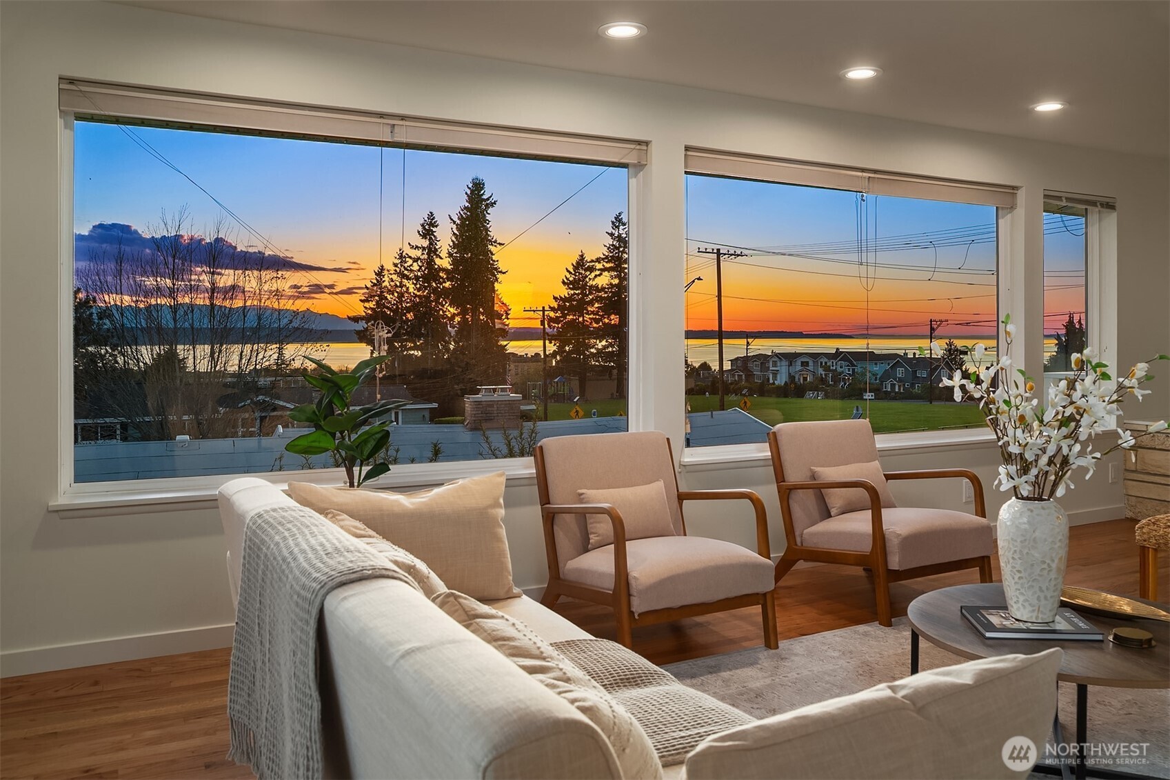 814 Dayton Street Edmonds, WA 98020 - Photo 4 of 36 a living room with patio furniture and a floor to ceiling window