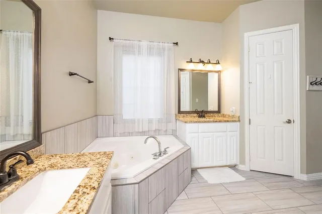 a room with furniture and a flat screen tv