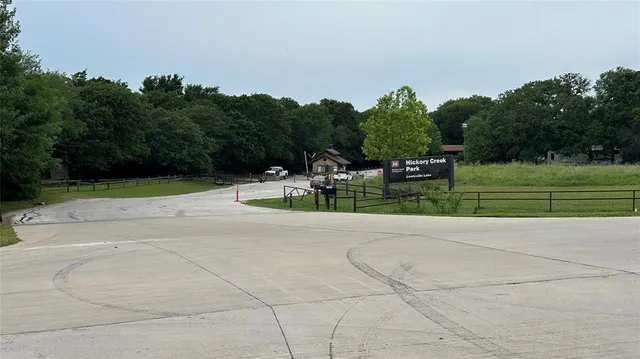 a view of swimming pool with trees