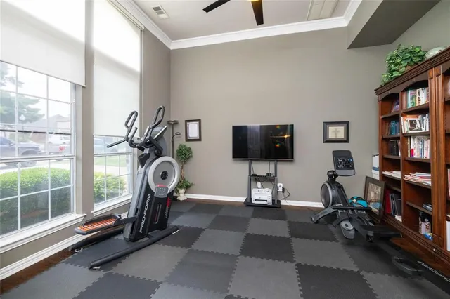 a view of a room with gym equipment